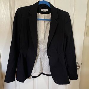 H&M black blazer fully lined with single button.